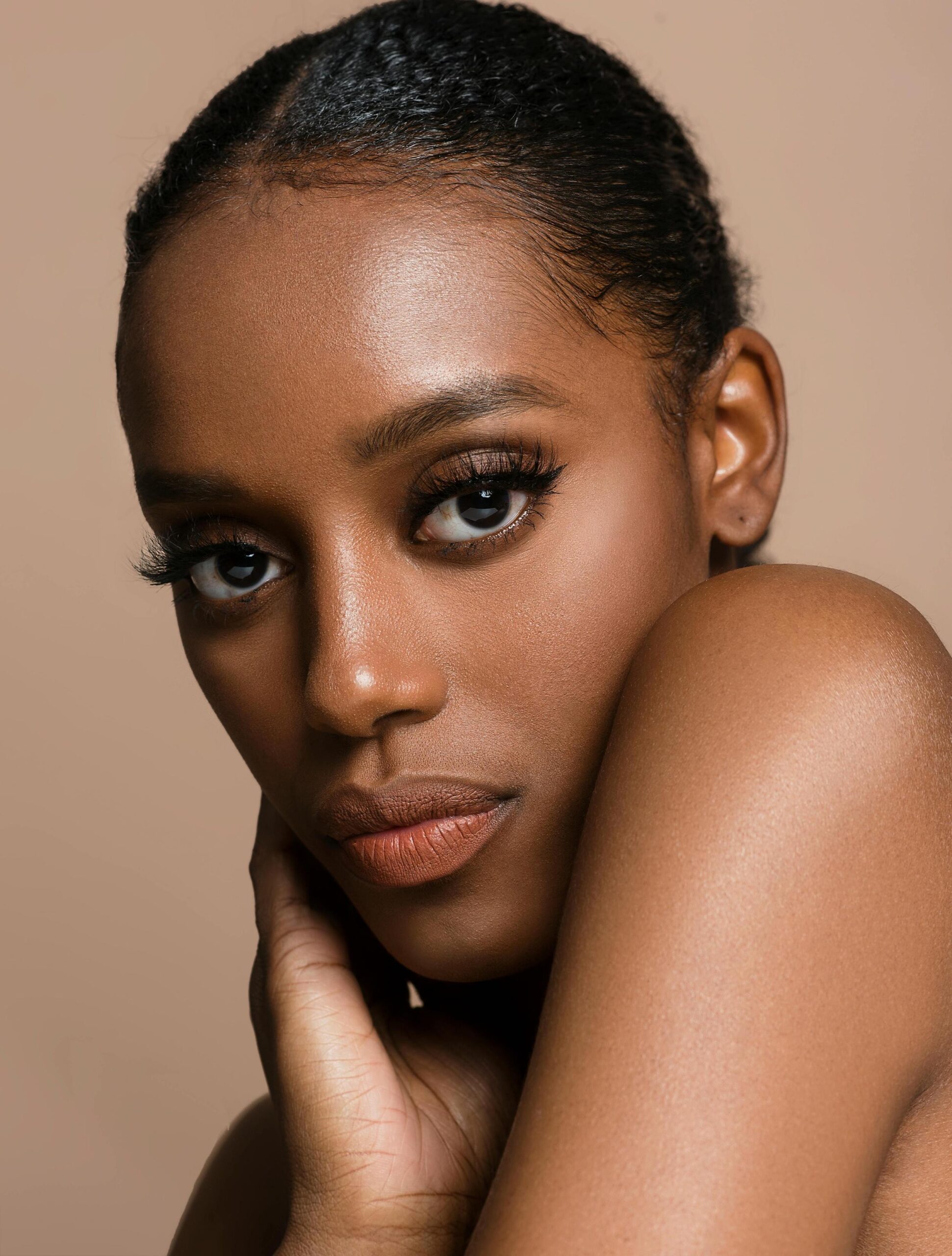 Head shot of a beautiful woman with dark-coloured skin